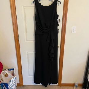 Black formal dress with ruching, very  flattering. Never worn!